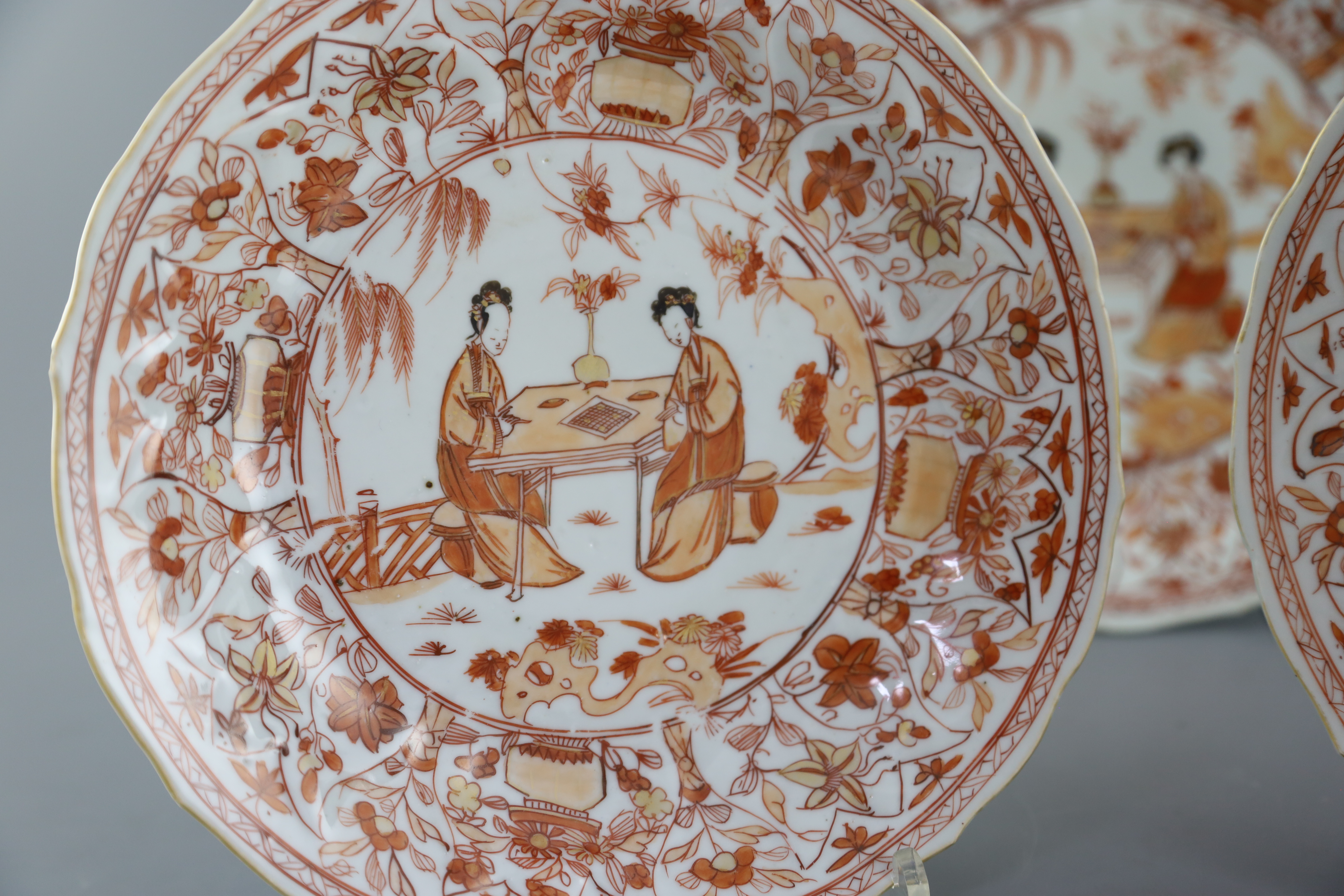 A set of three Chinese rouge de fer moulded dishes, Kangxi period, 22.5cm diameter